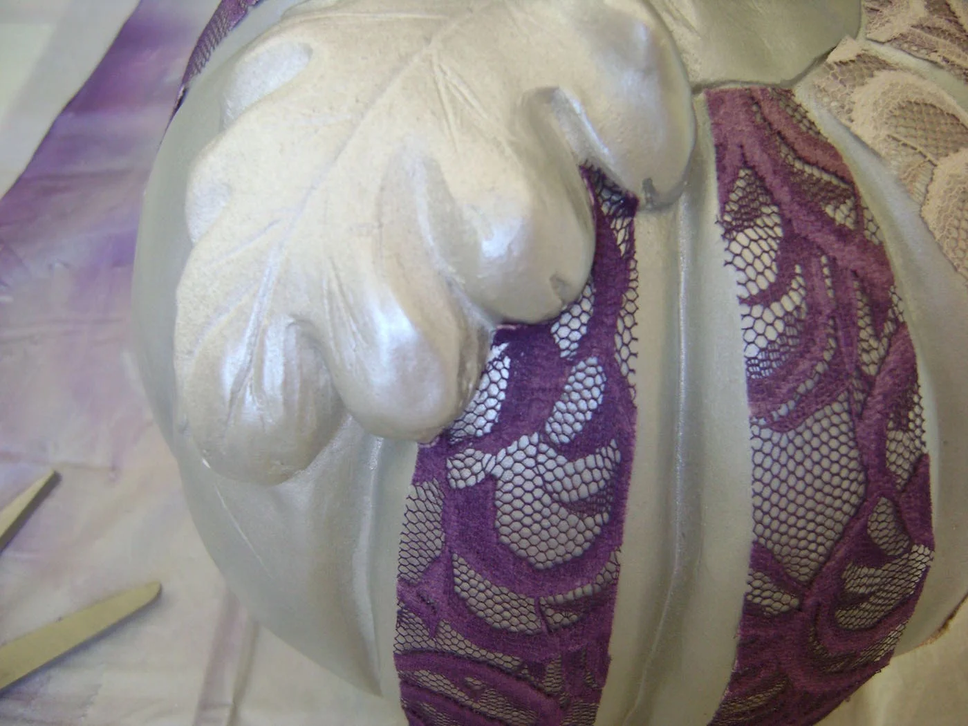 step 6 - Cut the lace to fit into the curves around the large leaf.