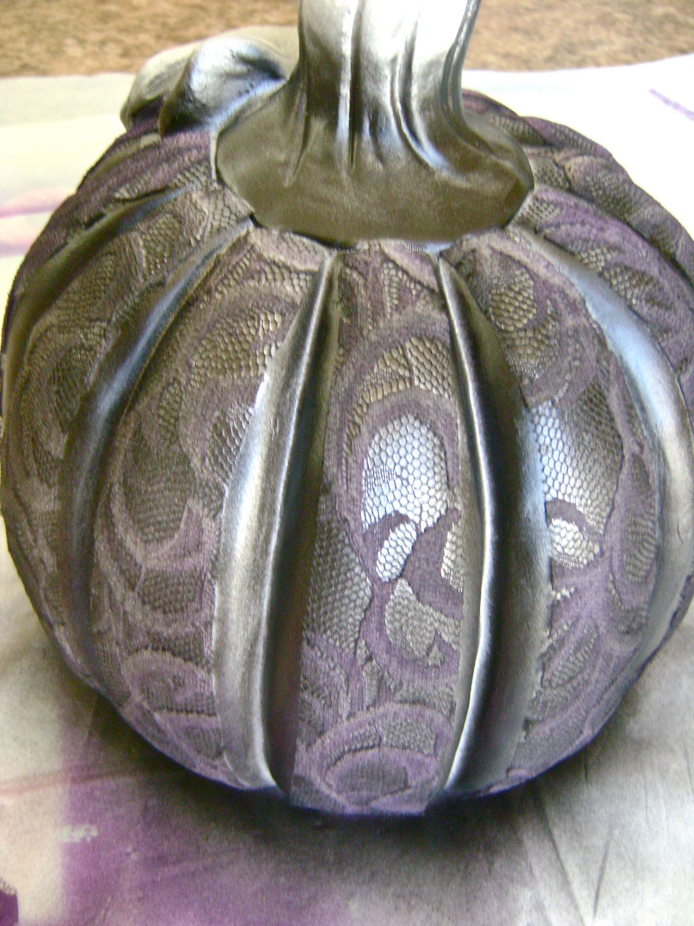 step 7 - Airbrush the entire pumpkin with light coats of black paint.