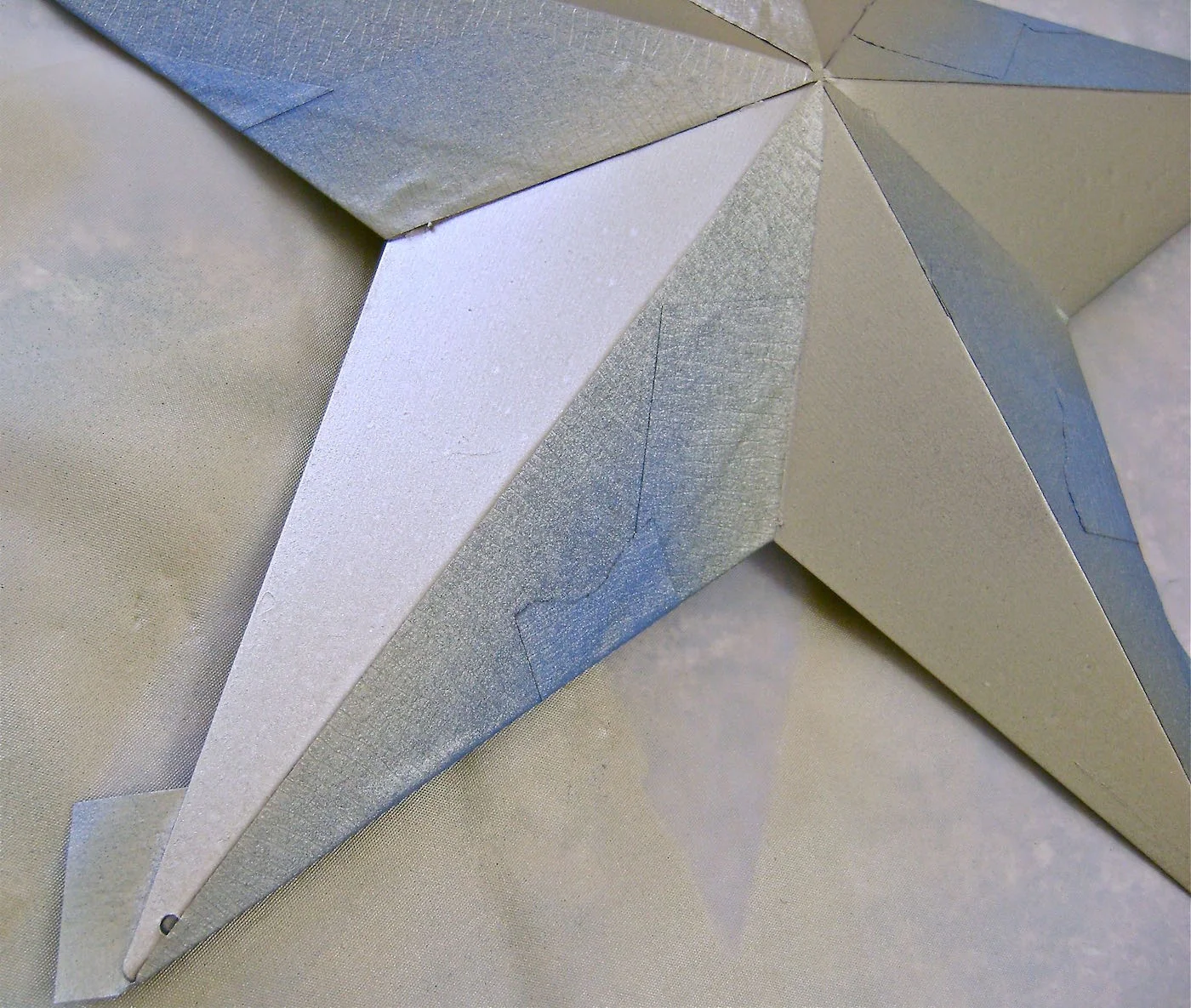 step 9 - Spray the star with gold metallic paint.