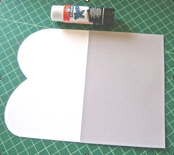 step 4 - Use the glue stick to attach the liner to the wrong side of the template, aligning the bottom edges.