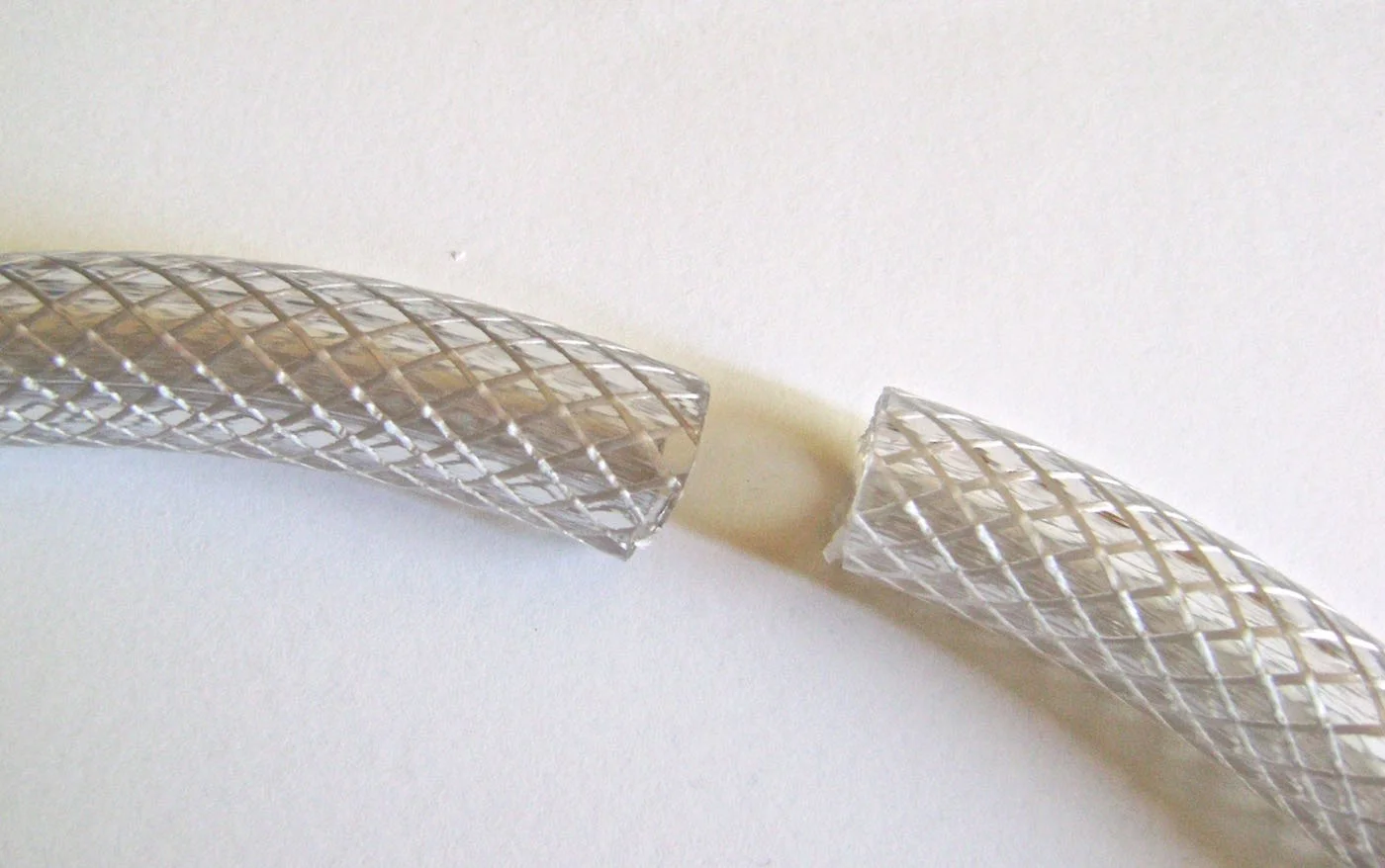 step 1 - Use a craft knife to cut the hose to the length you want. Make the ends as straight as possible.