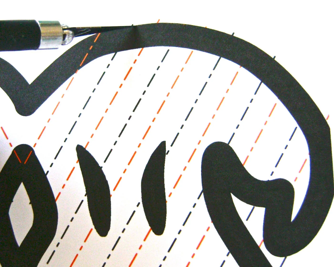 step 3 - Cut out the ghosts with a craft knife or Silhouette stencil cutting machine.