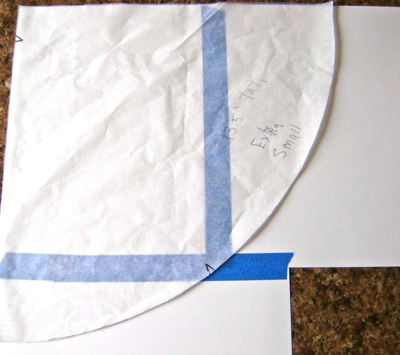 step 1 - Using Cyndy’s template, cut out a cone using regular card stock. Piece together enough card stock with tape to create a page large enough to fit the size of your cone. My cone size is extra small and it required three sheets of card stock.