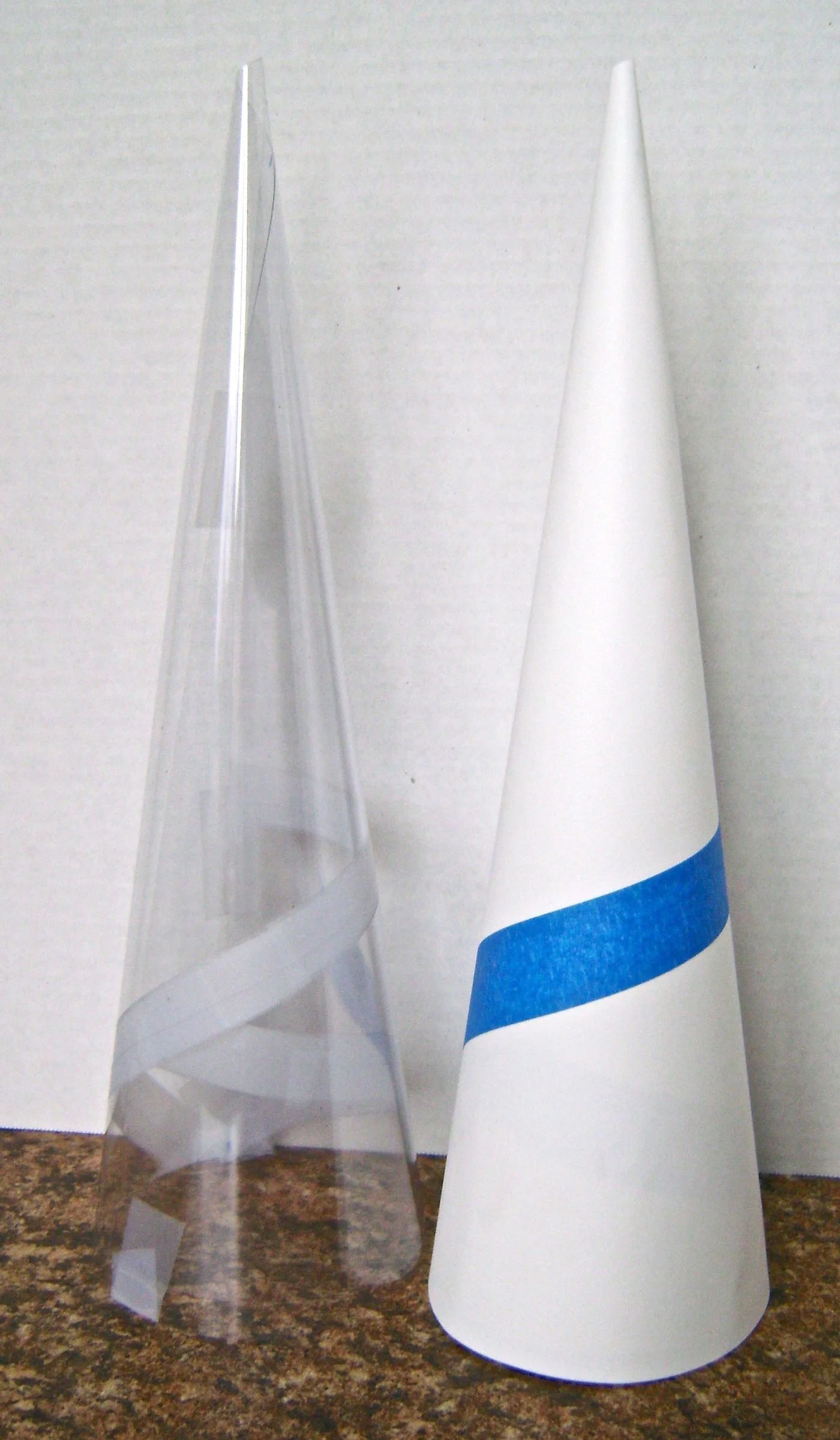 step 4 - You should now have two cones, one in card stock and one in clear plastic.