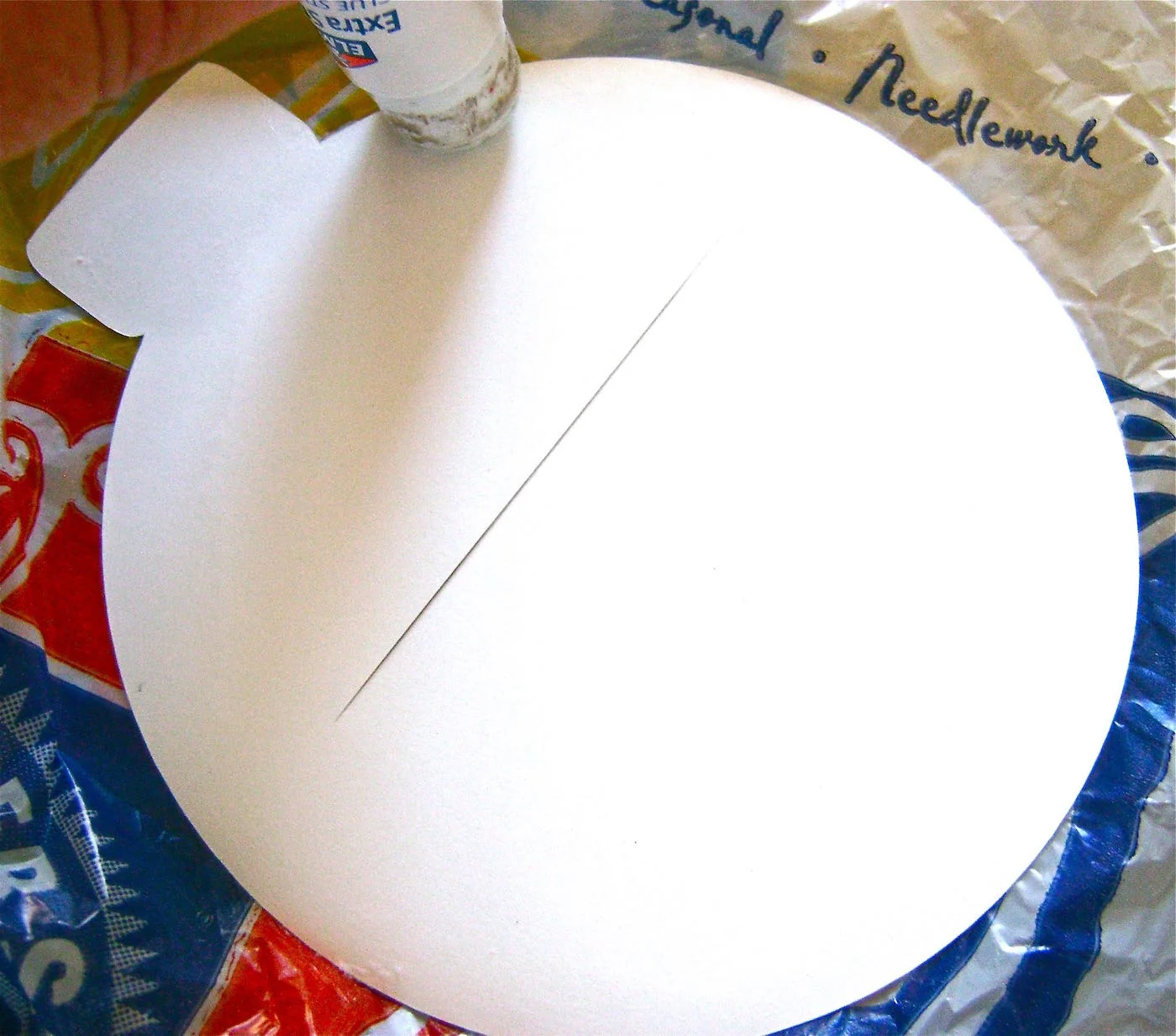 step 4 - On the back side of the back flap, apply glue along the card stock edges with a glue stick. 