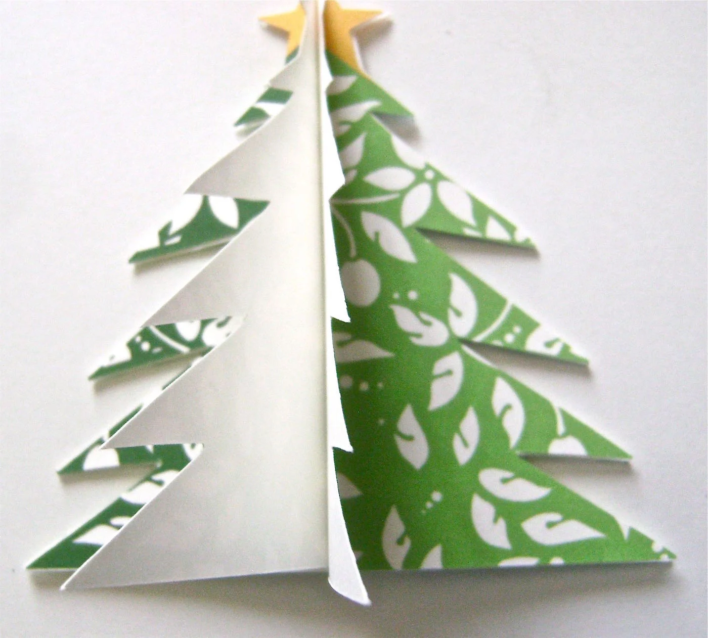step 6 - Glue the two halves of tree two and three to each other to complete a free standing tree.