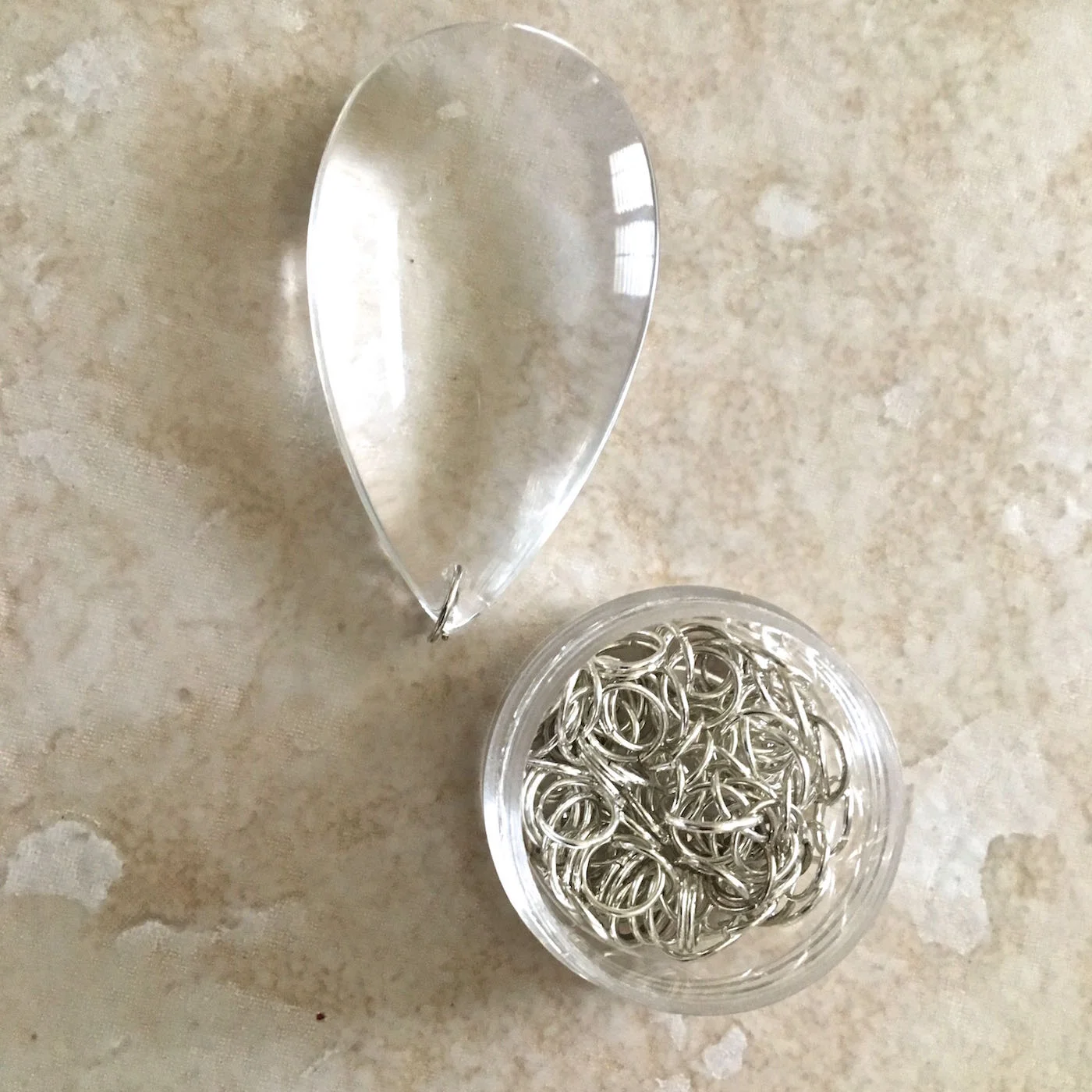 step 8 - Slip a 8mm jump ring into the hole in the crystal.
