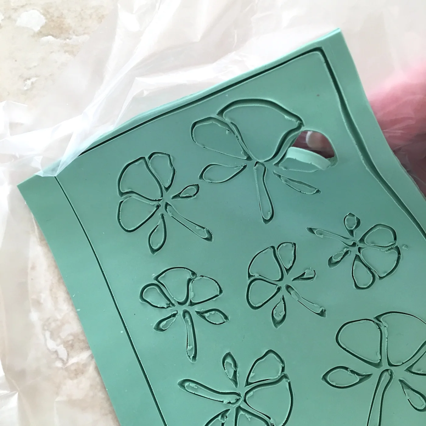 step 5 - Add white mica powder to the clay using your finger or a daubing tool.