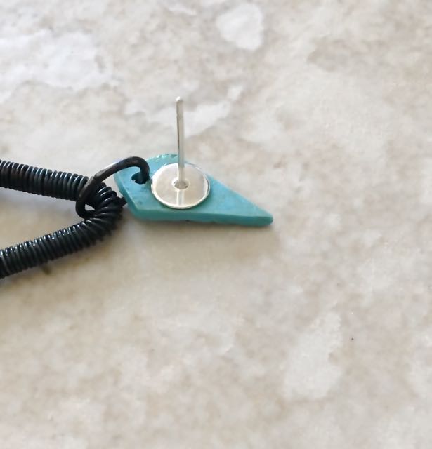 step 25 - Glue an earring post to the back of the “A” pieces with E6000 adhesive.