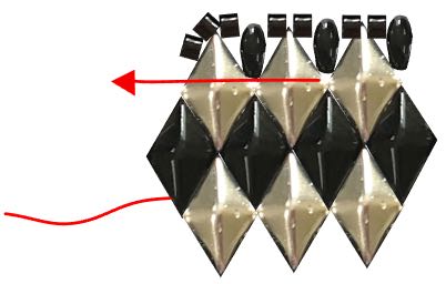 step 7 - Move the needle back in the opposite direction ending up at the top hole of the SDB.