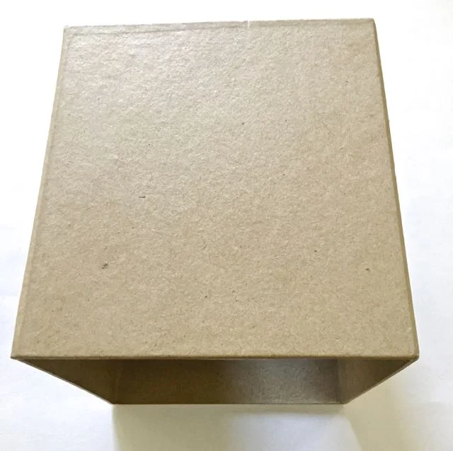 step 2 - I used a paper mâché tissue box I found at Michaels for my 5” cube form. You can make this project any size you like. You can even use an actual tissue box as your form. When using a different form than mine, remember to adjust the measurements for your panels. Also be sure your form is oven safe and covered with parchment paper. I made the height of my cube panels ½” shorter than the form. That way, the box protrudes from the clay making it easier to grasp and remove after baking.