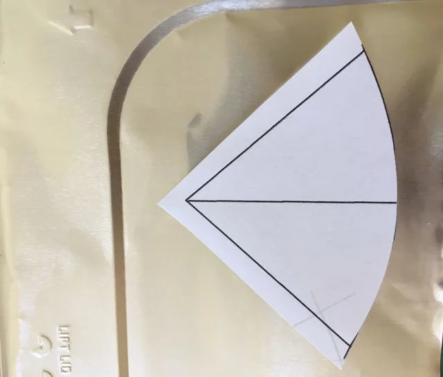 step 10 - Use Template “C” to cut the tin roof for house # 4. I cut my roof from the cover of a disposable, foil, baking pan.