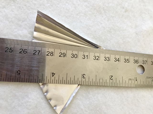 step 12 - Use a ruler to score the straight lines of the roof with .25” in between each line.