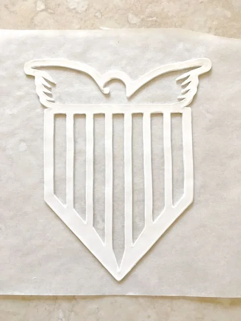 step 2 - Place the stencil on white clay. Cut out the shapes.
