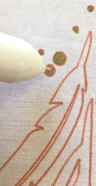 step 9 - Do not remove the vinyl adhesive backing. When all pieces are sketched, use the gold pen to fill in the circles.