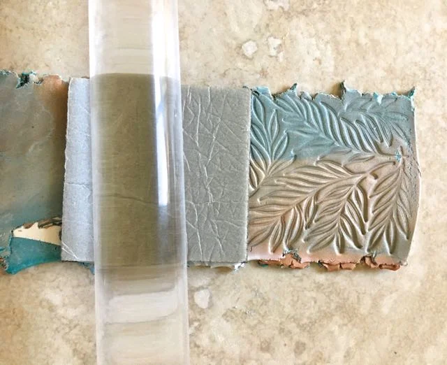 step 6 - Roll across a rubber stamp with the texture against the clay to leave impressions on the surface.