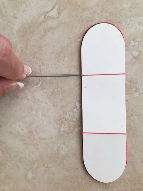 step 2 - Gently create a fine impression on the template with a sculpting tool to mark the clay where the flaps for the mailbox lid and its back wall begin.