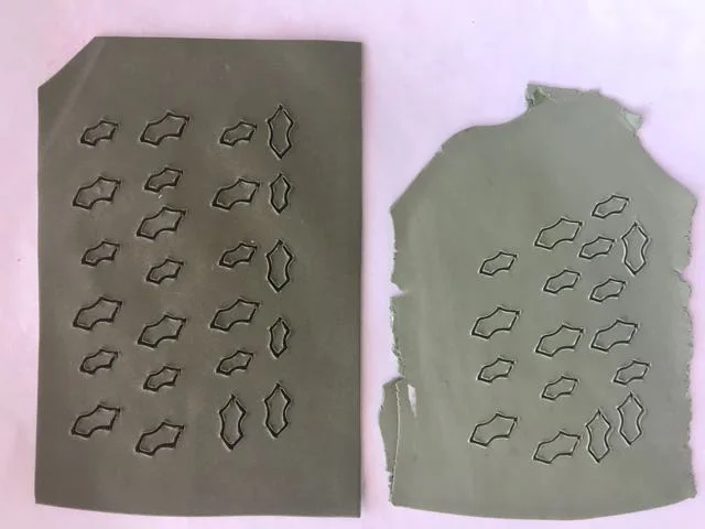 Step 13 - Use the template or cut files to cut several green holly leaves. There are two sizes and two shades of green. One is Green and the other is Green mixed with a little White.