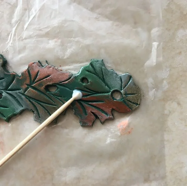 step 8 - Apply a small amount of translucent liquid polymer to the clay.