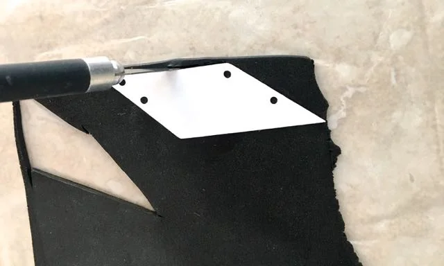 step 2 - Roll out one and a half ounces of Black Souffle clay on the #2 setting of the conditioning machine. CK - Using the templates, cut out the black necklace pieces with your knife. Arrange them in order on a mat or card stock. Set aside. 