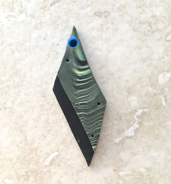 step 12 - CK - Cut out the marked holes with a 3mm hole cutter, piercing through both layers. 