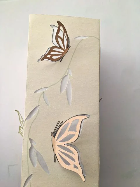 step 11 - Overlap the cut end onto the flap and press to create the box shape.