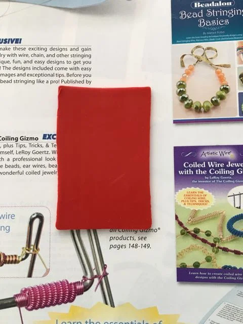 step 1 - Open the catalog. Cut two 2" x 3" clay rectangles. Place one on the page. Set the other aside.