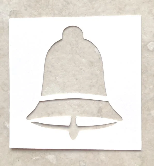 step 1 - Download the bell template and print it out on card stock. Cut on the printed lines. I cut four copies for my project. The more copies you use, the deeper the impression will be. If you use multi layers, spray adhesive on the back of each copy and stack them with the edges aligned.