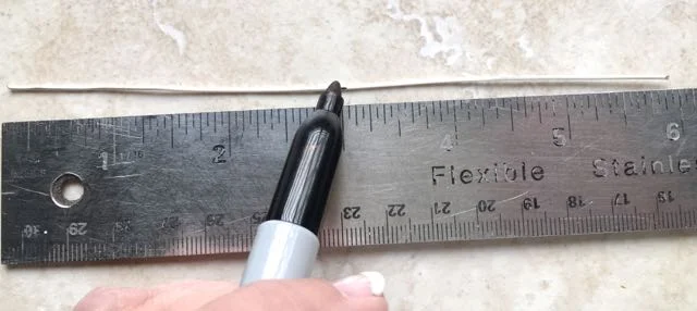 step 3 - Using a Sharpie, place a mark at the center of each wire.