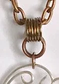 step 17 - Attach the bail to the pendant with one 6mm jump ring. Insert a copper chain into the bail.