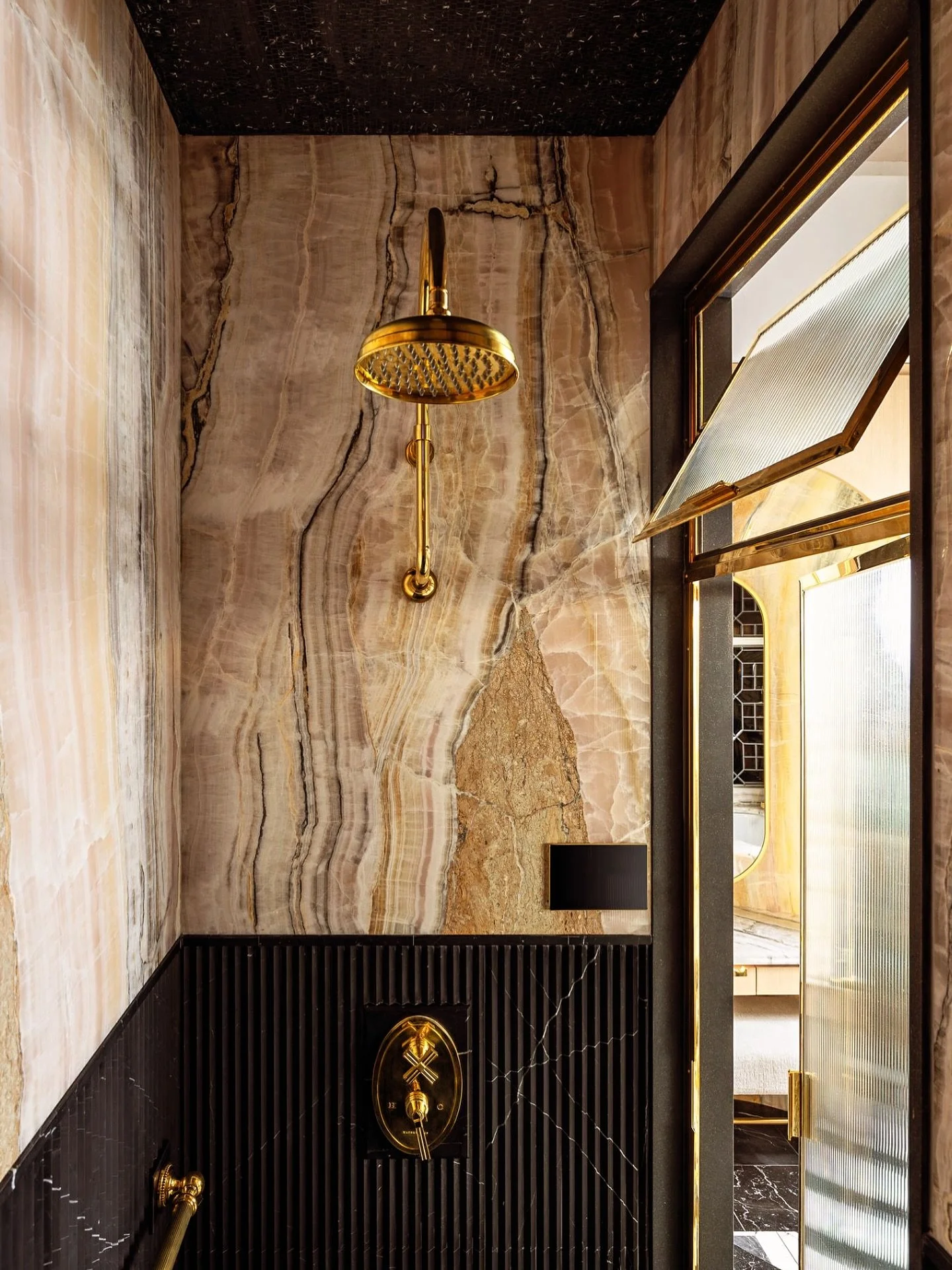 We turned up the heat on this Master Bath, because the best things happen when things get a little steamy! 😉  #steamshower #aromatherapy #glamshower #luxuryhomes #luxurybathing #artdecostyle #marbleshower #onyxstone #getsteamy