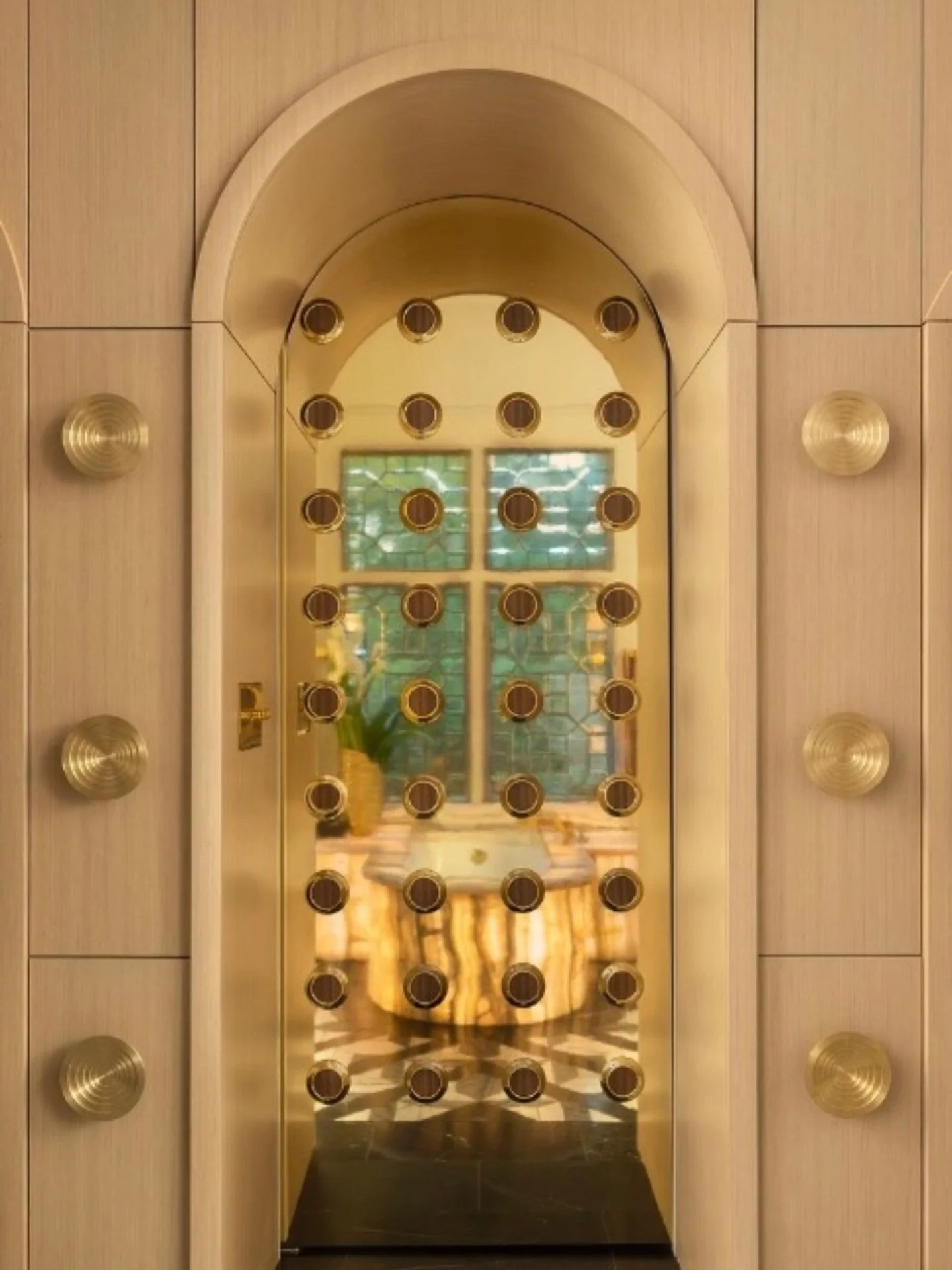 From Portugal to my Art Deco bathroom &mdash; and baby, she was worth the trip!

This custom brass pocket door with walnut inlay is one of those details that changes the whole atmosphere of a space. Rich, sculptural, and just dramatic enough. Even be