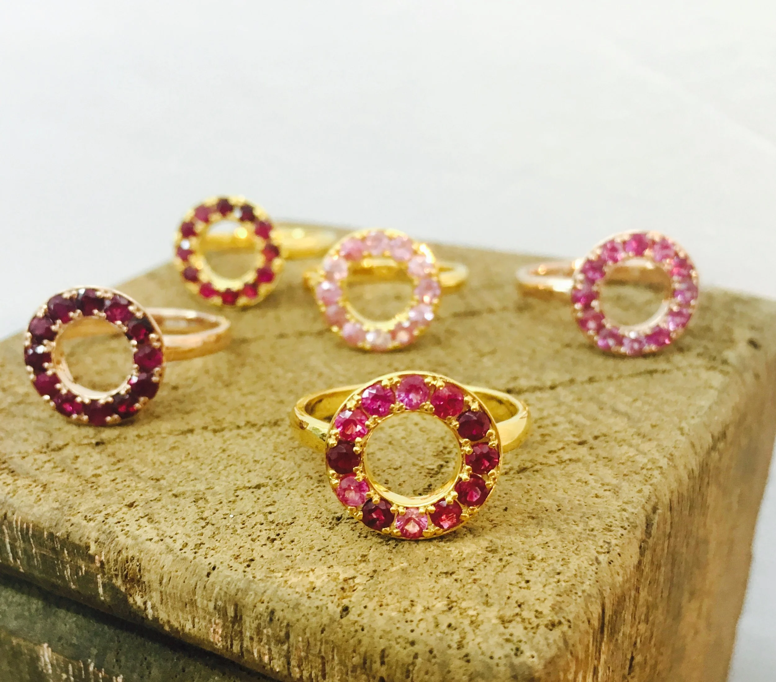 Gold Ruby and Sapphire Halo Rings