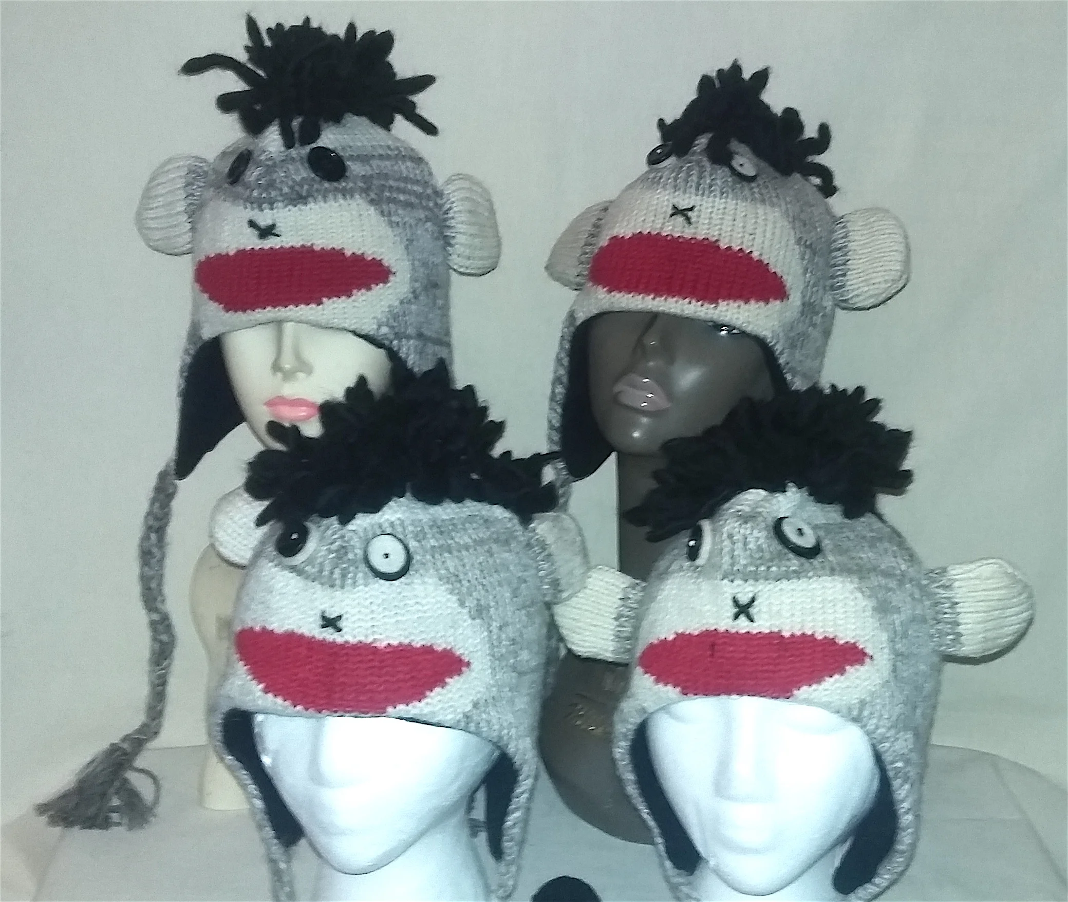 Set of 4 Sock Monkey Kids Hats.jpg