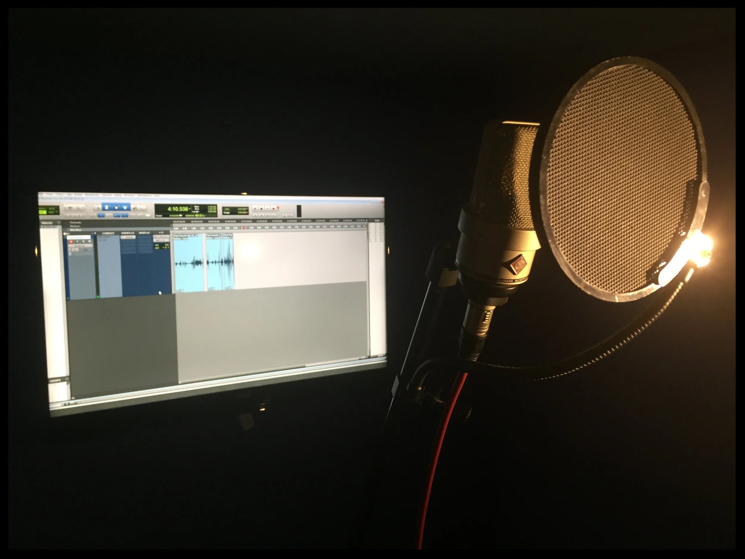 Recording comedic death gurgles in the VO booth at Futureworks. The dark environment really helped me get into character!