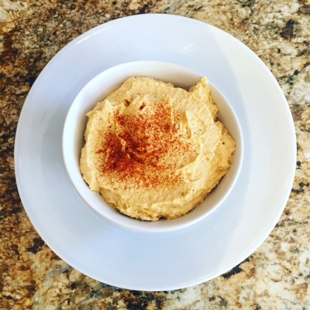 Pumpkin Hummus - A Fall take on the classic What you need: ¼ cup pumpkin 2 cups of chickpeas (equivalent to 1 can) ¼ cup Tahini ⅛ cup Olive Oil 1-2 cloves of garlic Water, lemon, salt and pepper to taste (add water at the end only if its a little too thick for you) Optional: Sprinkle a little paprika on top of the finished product to be fancy Throw all ingredients into a magic mix/food processor or blender until smooth. Serve with whole grain crackers, carrots or sliced red pepper.