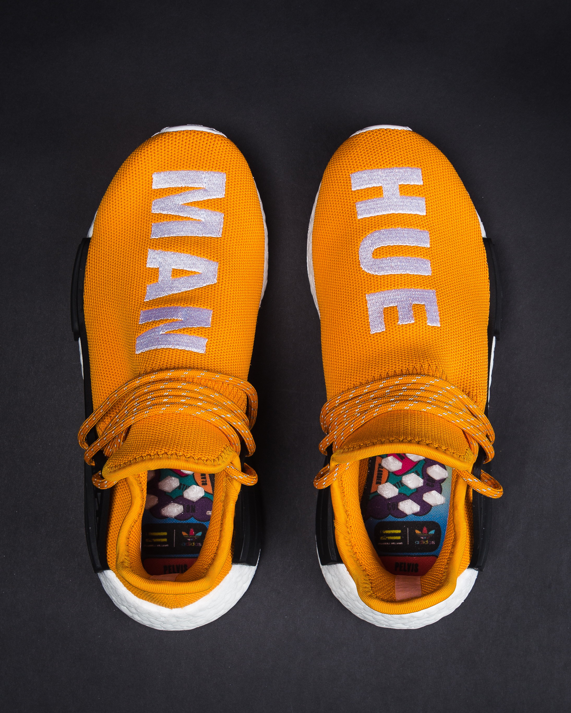 nmd human race tangerine
