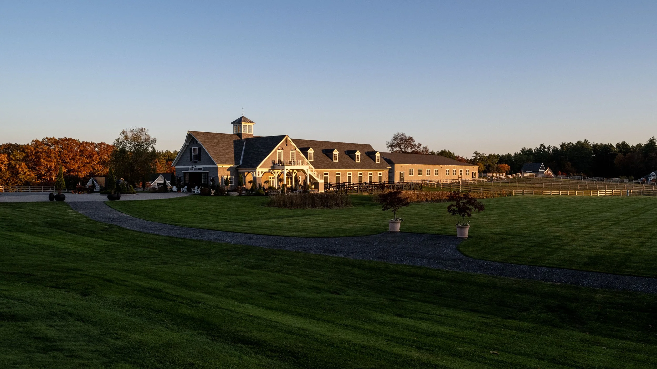 Bonterra Farm barns at twilight — Blackburn Architects — Dover New Hampshire — equestrian architecture photography by Tobin Davies