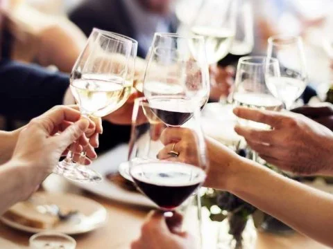 toasting-drinking-wine-champagne-out-to-dinner.jpg
