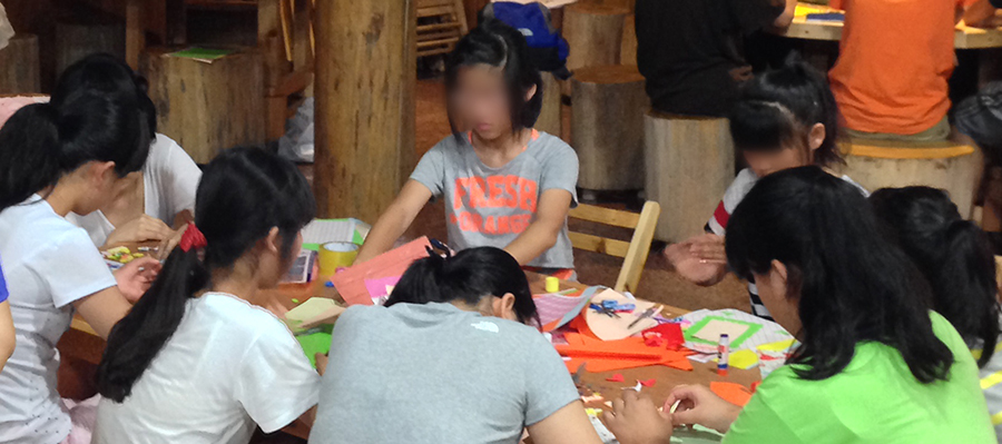 Ha-neul working on crafts at our annual children's retreat.