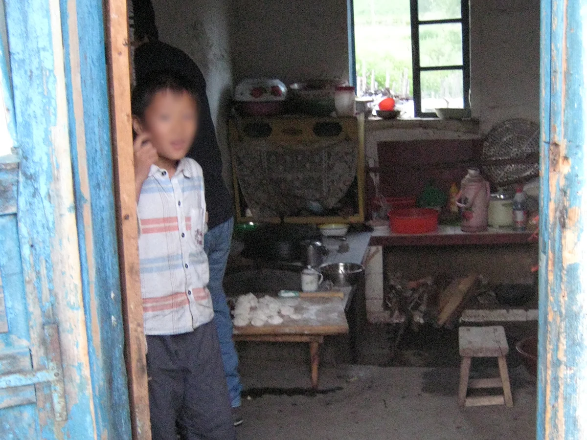 The son of a repatriated North Korean woman welcomes us into his home in rural China.