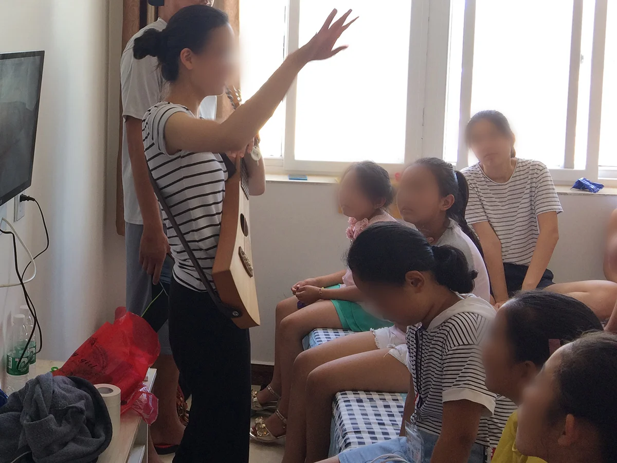 Children of North Korean women learning new songs at our annual retreat.