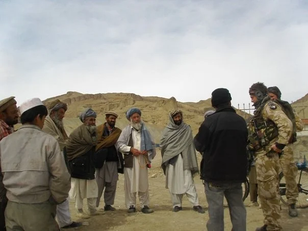 Me, my interpreter, and the Shura of a village in Bamiyan, Afghanistan, 2009. 