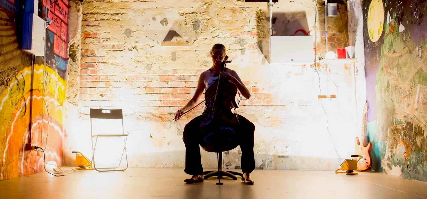 ENSEMBLY Founder Louise McKay playing Cello in Studio StartUp Basement