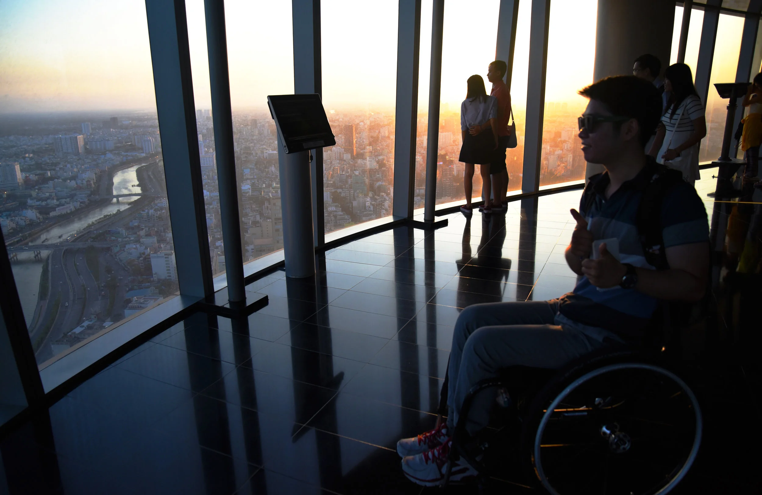 Producer Kunho Kim on location at the Bitexco Financial Tower for filmingg 10 Days in Saigon.