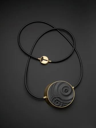 Jo Wilmot 'Ripple Effect' 2017 porcelain, brass, nitrile, leather