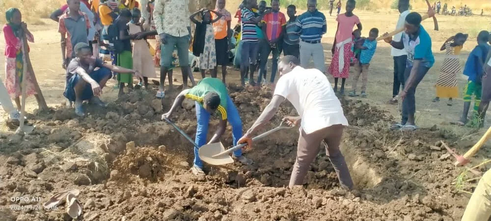 Digging baptismal for new believers