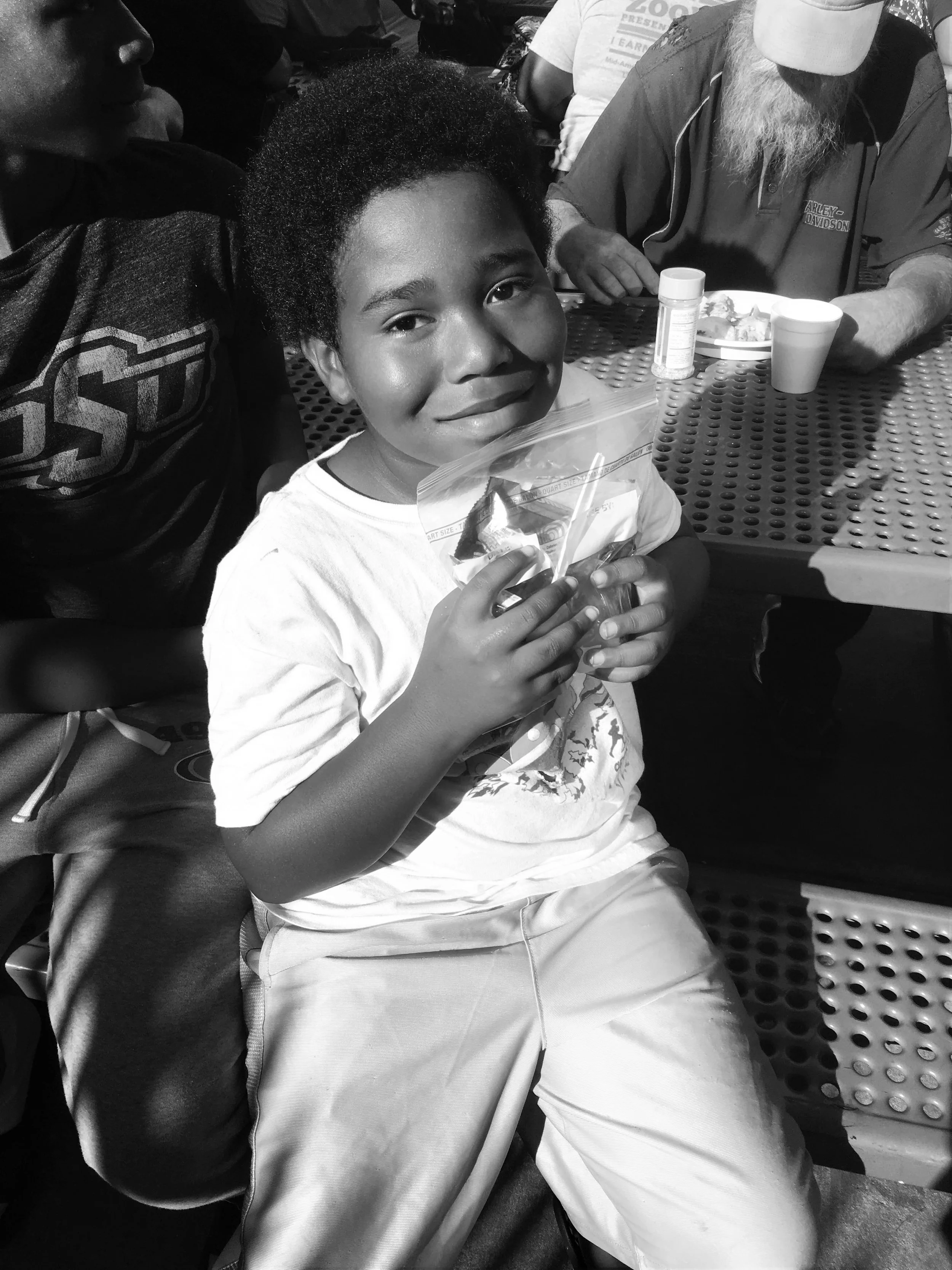 Trent, age 8, is happy to have his Kids Pack