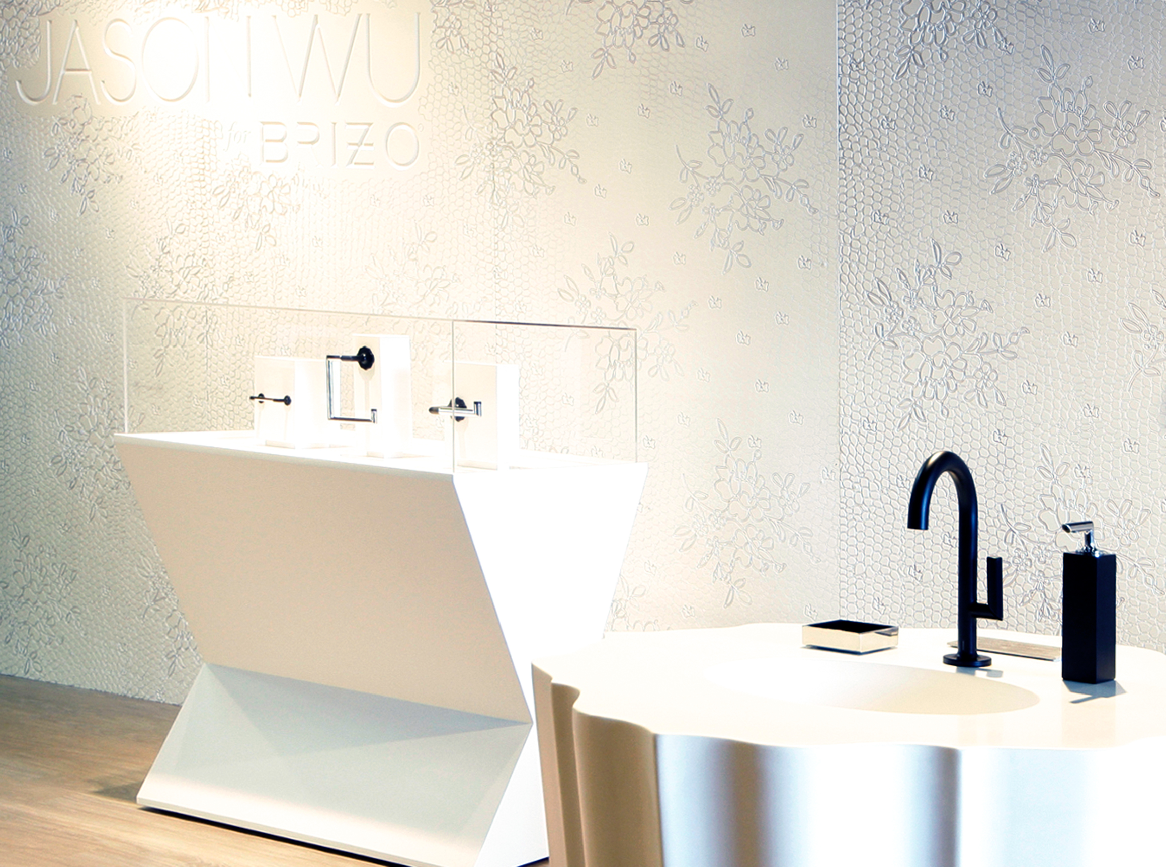 Brizo Jason Wu collection minimal modern bathroom showroom with black fixtures