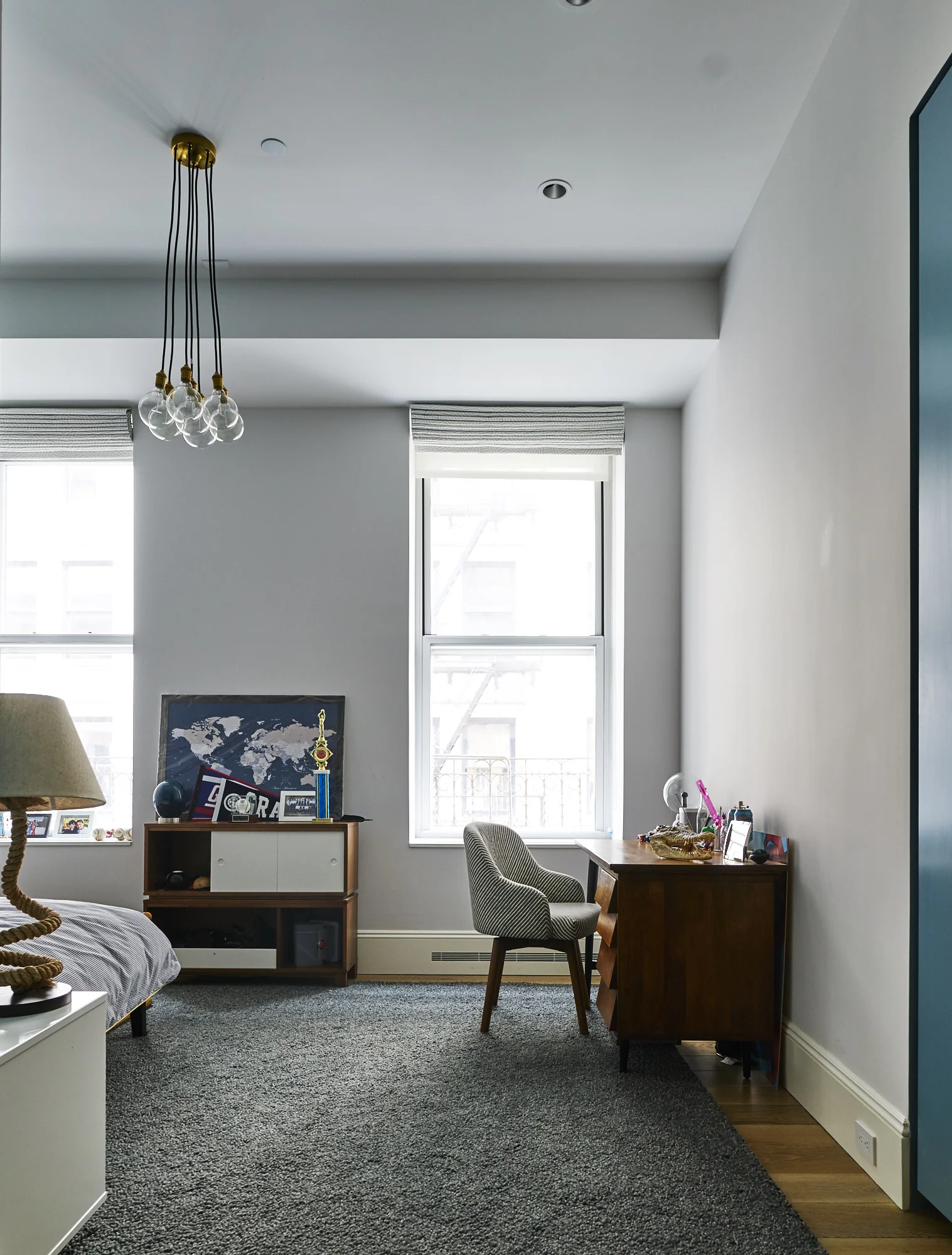 Modern Soho loft renovation young blue boy's room